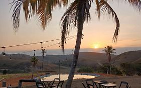 Espaço fazendinha por do Sol da piscina